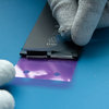 Applicazione del nuovo adesivo sulla batteria #1