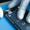 Rimozione delle strisce adesive della batteria #2
