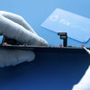 Smontaggio della piastra protettiva LCD dall’assembly display #1